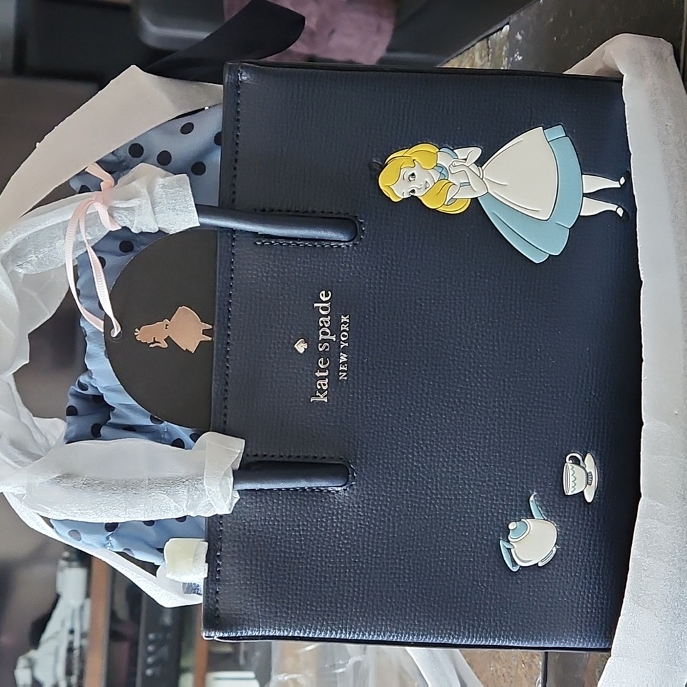 kate spade Alice In Wonderland purse.